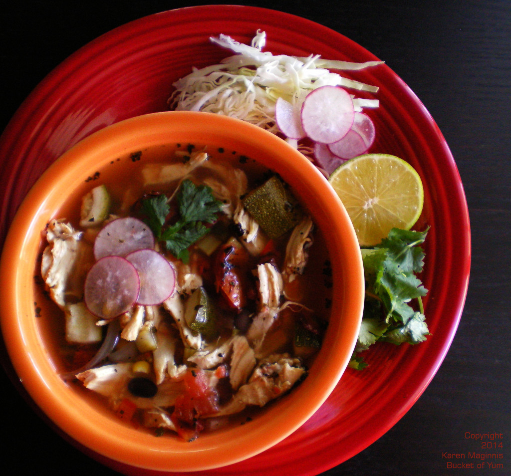 Tender chicken, zucchini, spicy broth and fresh condiments. Yum.