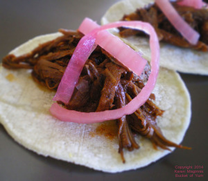 Tender shredded beef, seasoned to mouth-watering goodness, topped with tangy, crisp onion.